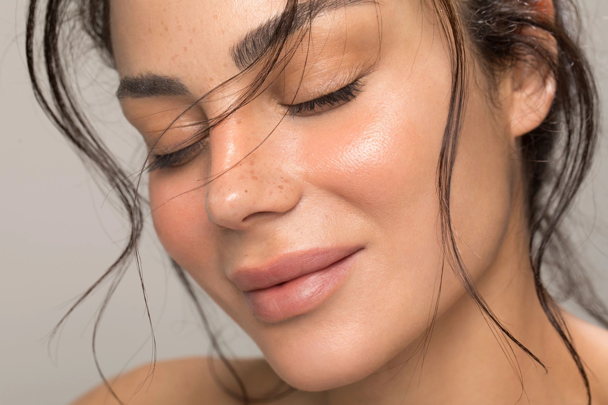 Close-up portrait showing natural, healthy skin texture