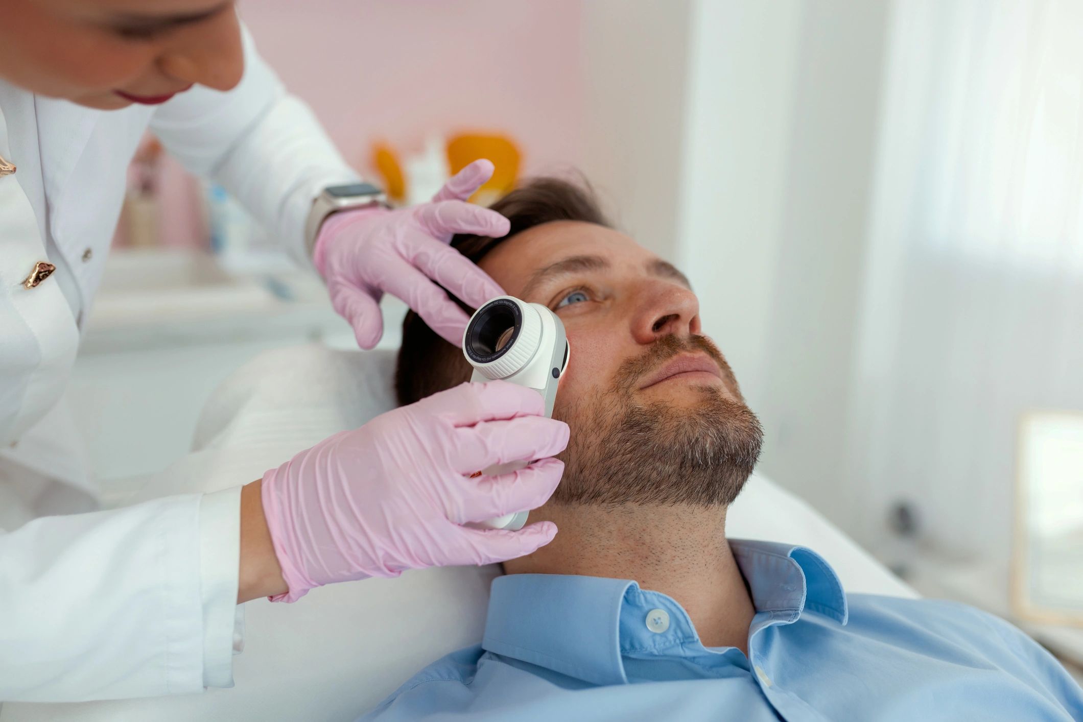 Dermatologist performing a professional skin screening in a clinic