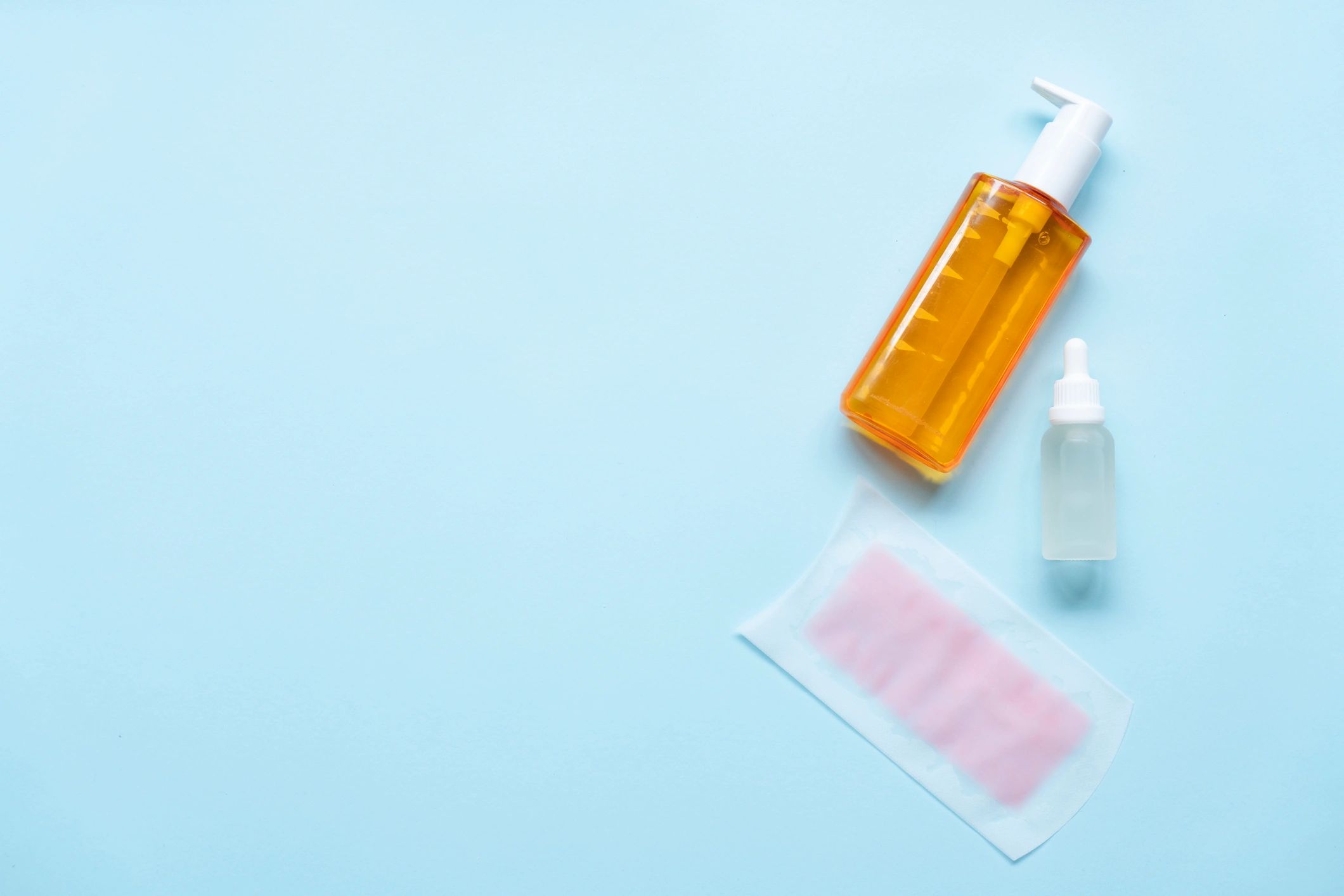 Skincare products arranged on a clean background