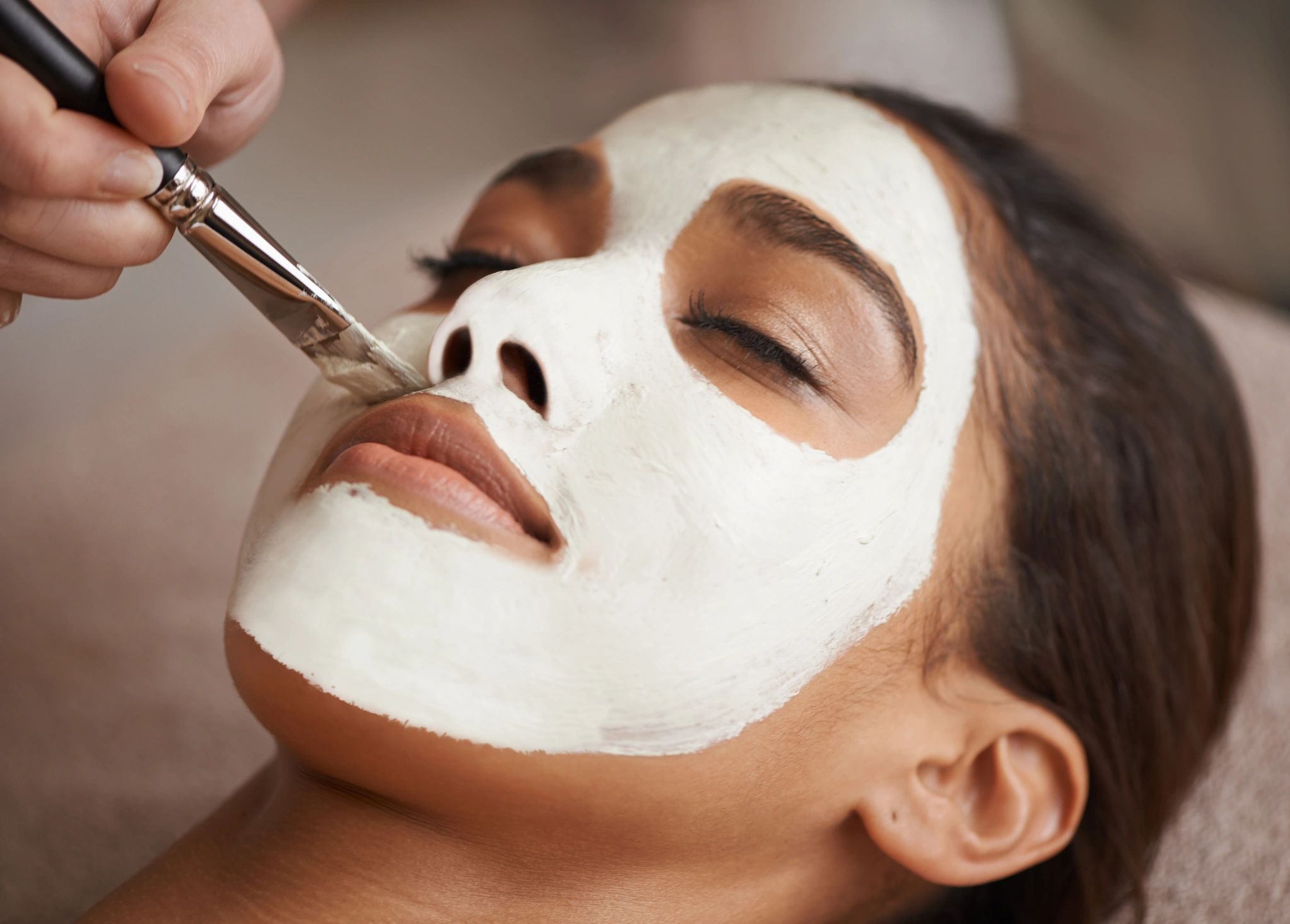 Facial mask application at a skincare clinic