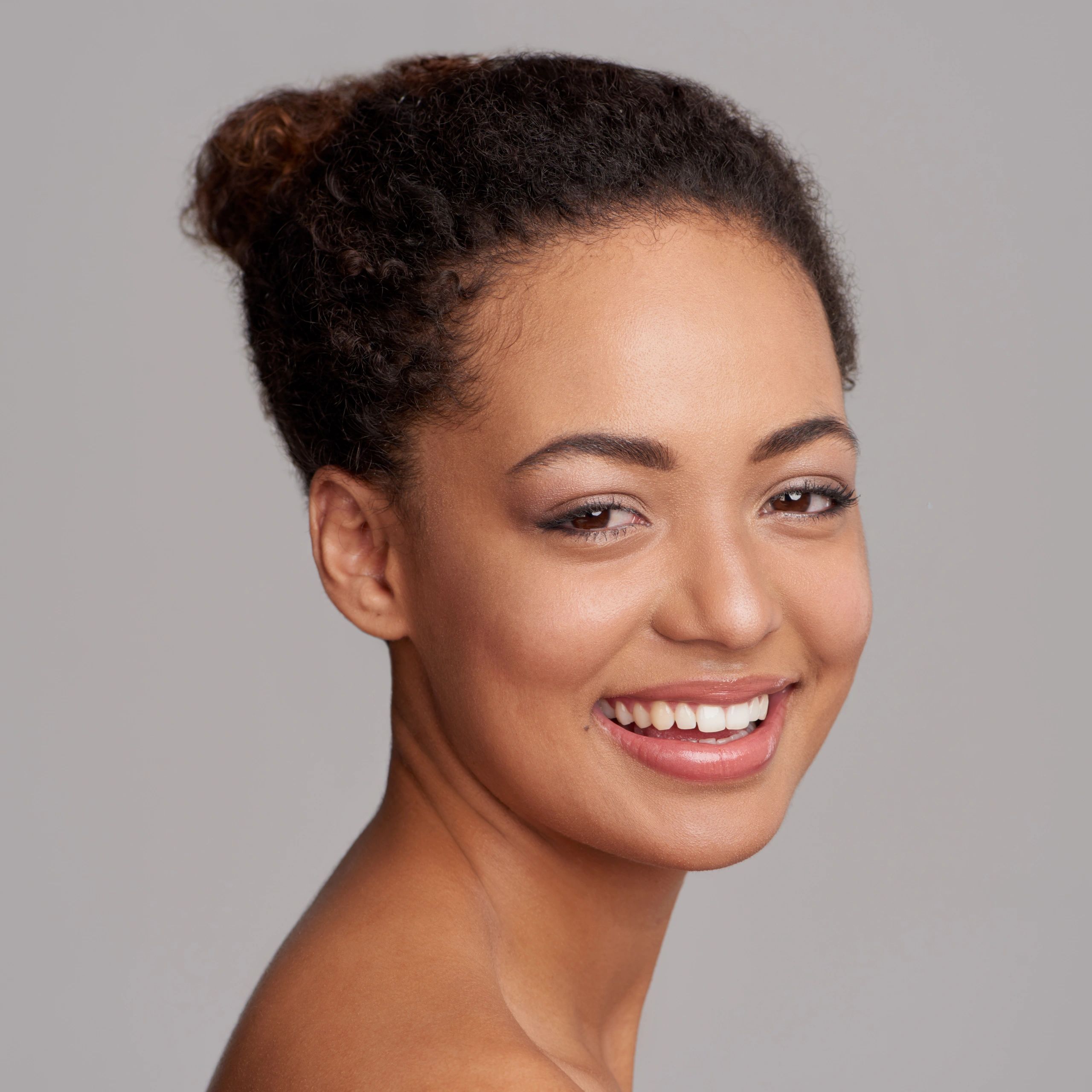 Portrait of a smiling woman with natural makeup